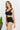 Marina West Swim Sanibel Crop Swim Top and Ruched Bottoms Set in Black - The Fashion Unicorn