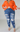 High Rise Cat Whiskers Washed Medium Blue Denim Frayed Hem Distressed Jeans - The Fashion Unicorn