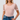 Pink Bodysuit with Sheer Polka Dot Sleeve - The Fashion Unicorn