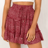 Women's Solid Color Tiered Ruffle Waist Tie Mini Skirt - The Fashion Unicorn