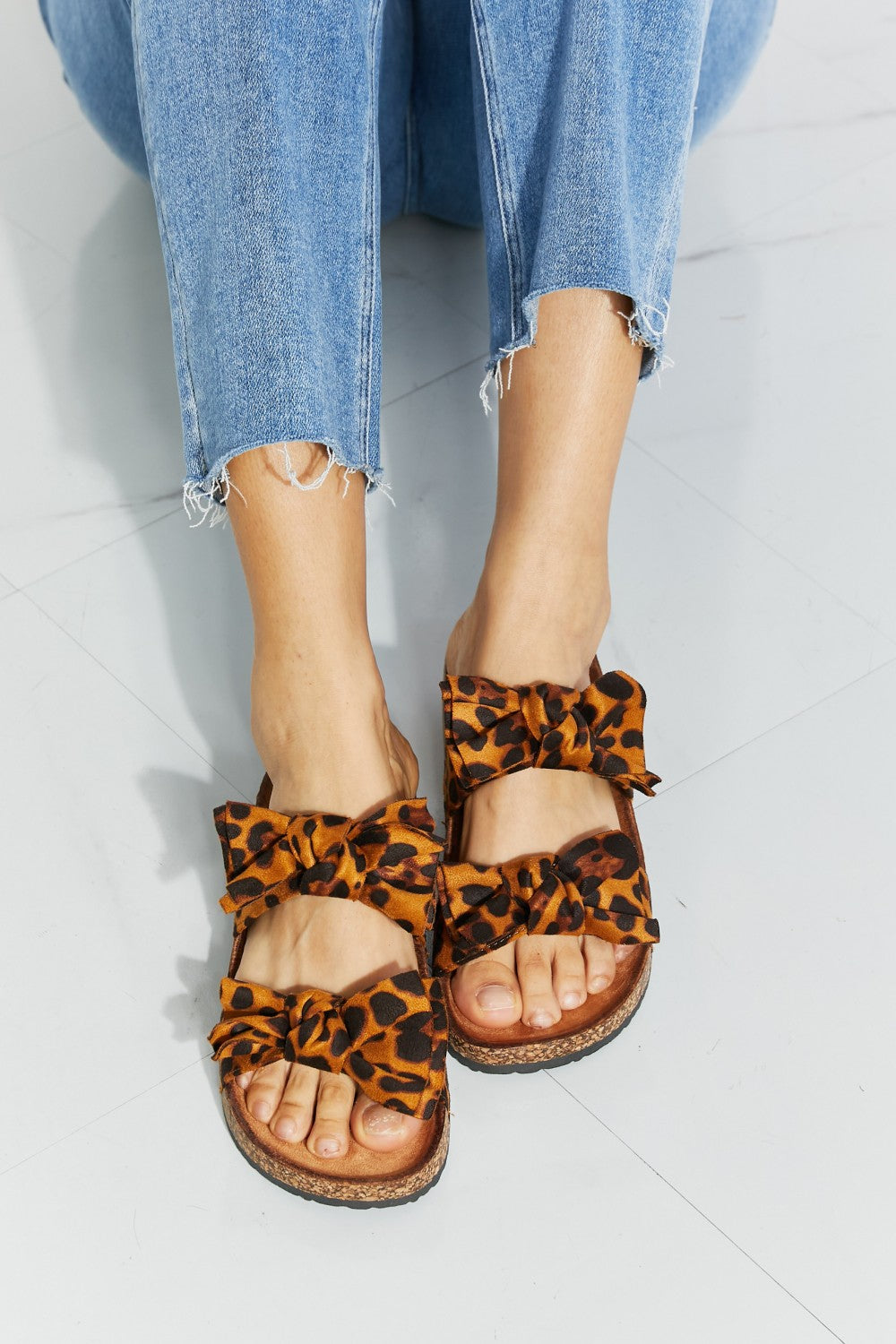 Forever Link Fiercely Feminine Leopard Bow Slide Sandals - The Fashion Unicorn